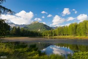 Le lac de Roue fin de journée : soleil, reflets, forêt